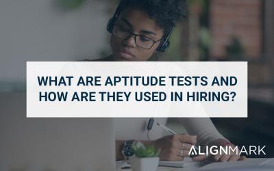 What are aptitude tests and how are they used in hiring?
